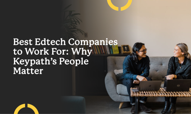 Two colleagues sitting on a couch discussing work